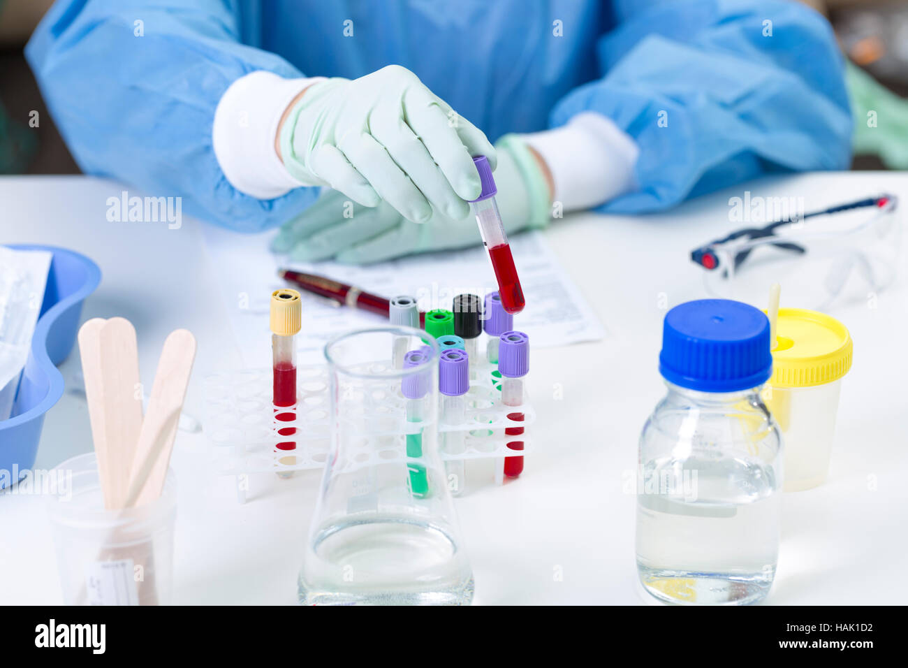 scientist analyzing test samples in a laboratory Stock Photo