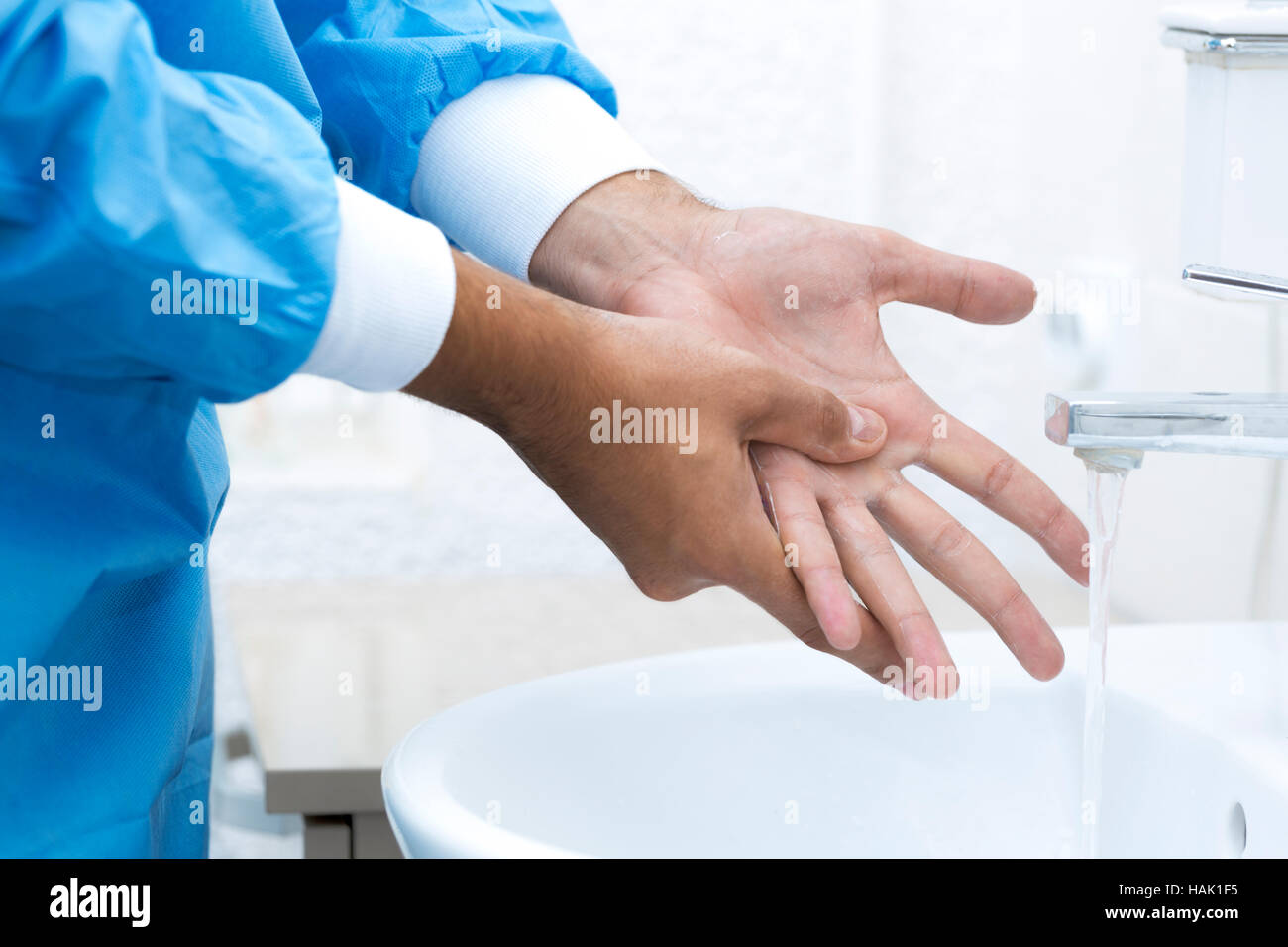 surgeon washing hands before surgery Stock Photo