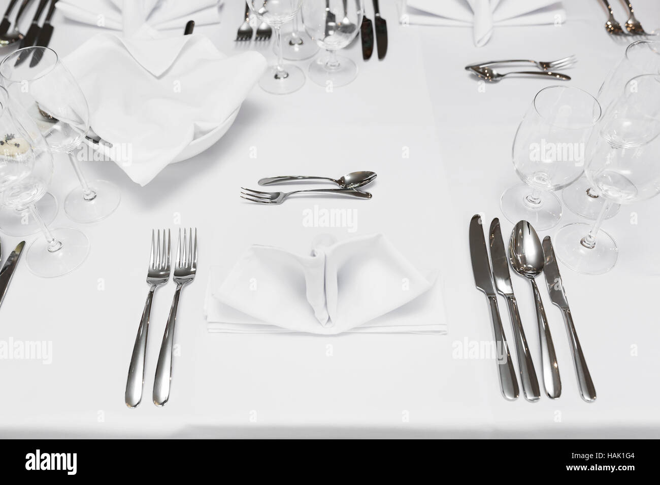 restaurant table with cutlery and glasses Stock Photo