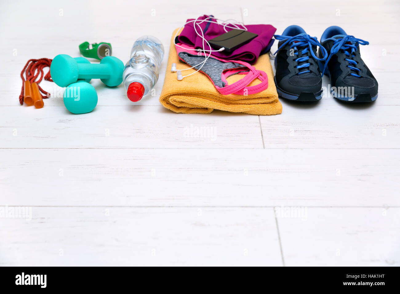 fitness workout equipment on gym floor with copy space Stock Photo