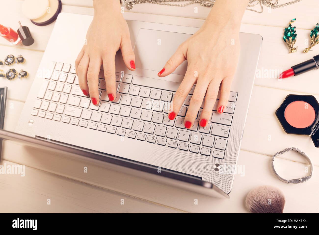woman writing fashion blog. laptop and accessories on the table Stock Photo