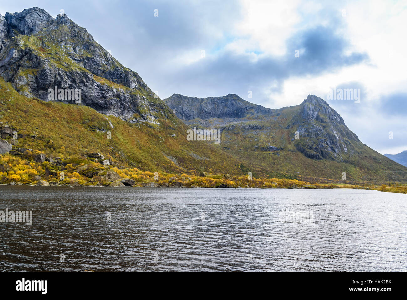 Beautiful mountain and river landscape with blue sky, Lofoten, Northern Norway, selective focus Stock Photo
