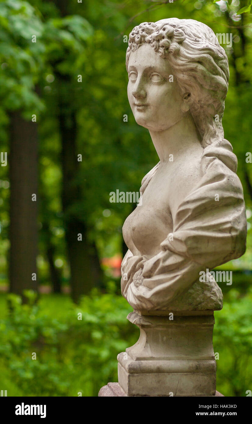 Sculptural bust of the Goddess Flora in the Summer Garden, St. Petersburg Stock Photo