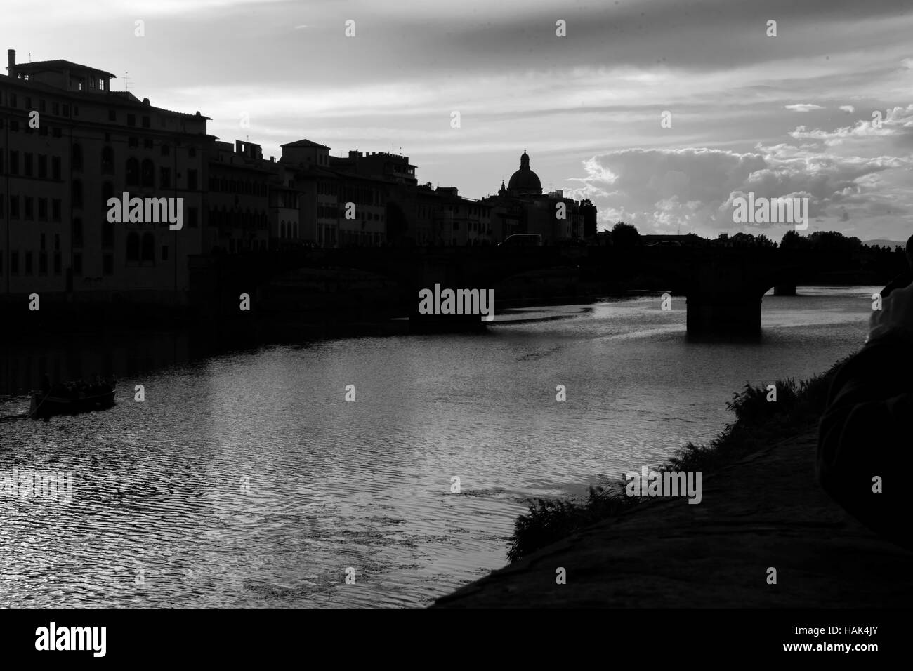 Florence silhouette with  Arno River and Medieval stone bridge , capital of Tuscany region, Italy Stock Photo