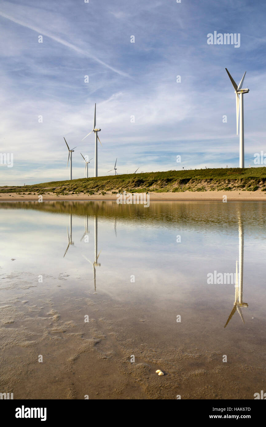 Windmills on the Maasvlakte beach Stock Photo