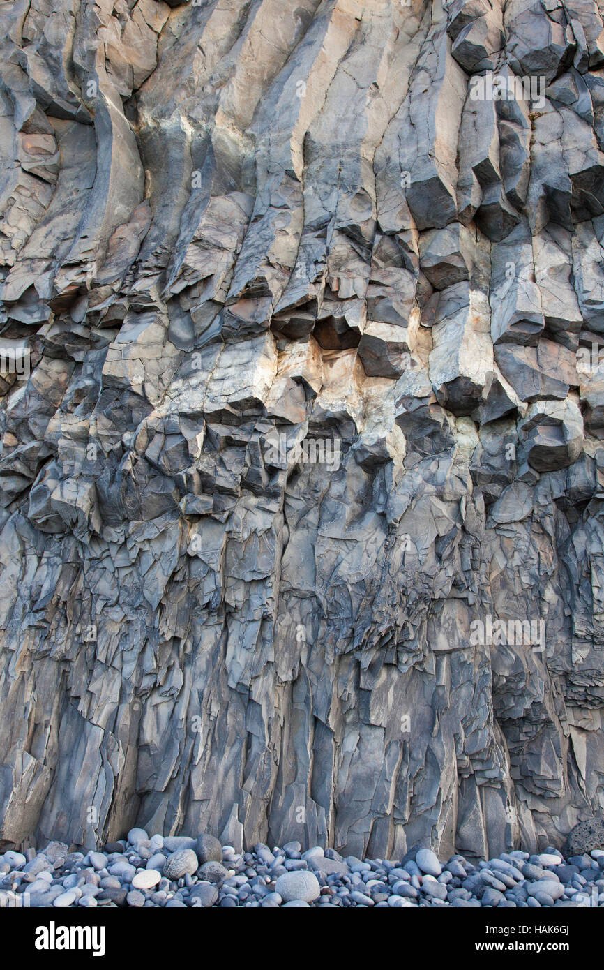 Hexagonal basalt columns, volcanic rock formations near the village Vík í Mýrdal, southern Iceland Stock Photo