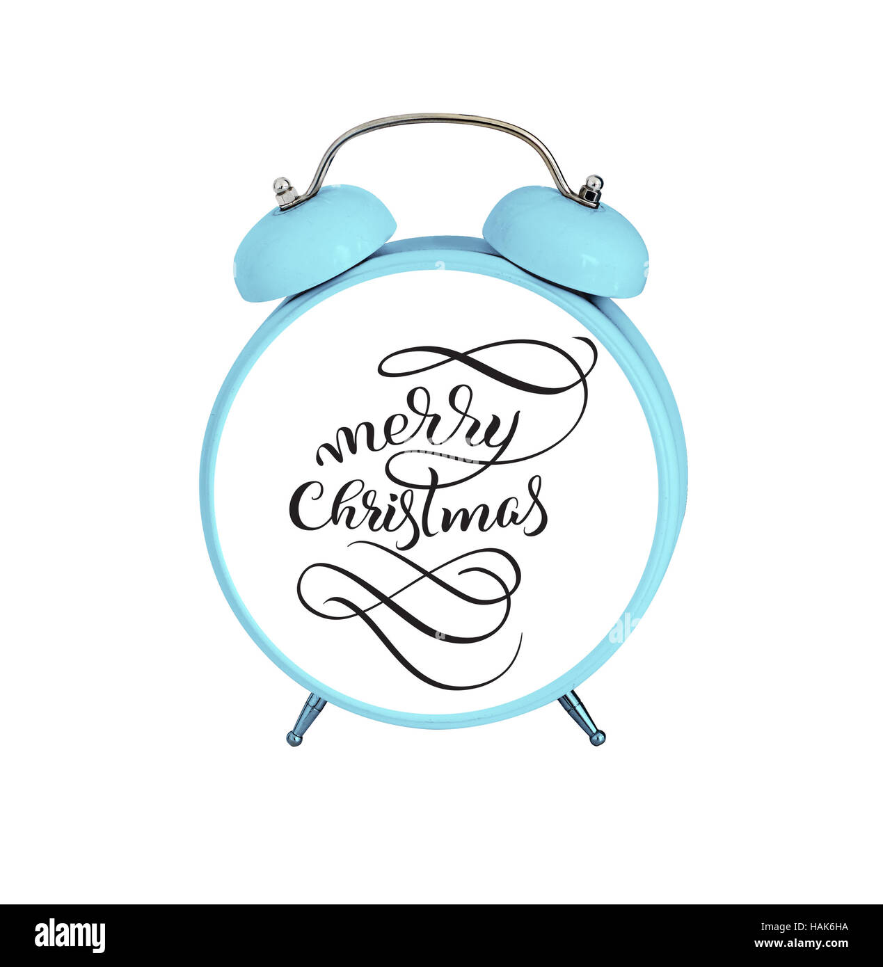 mechanical alarm clock isolated on white background and text Merry Christmas. Calligraphy lettering Stock Photo