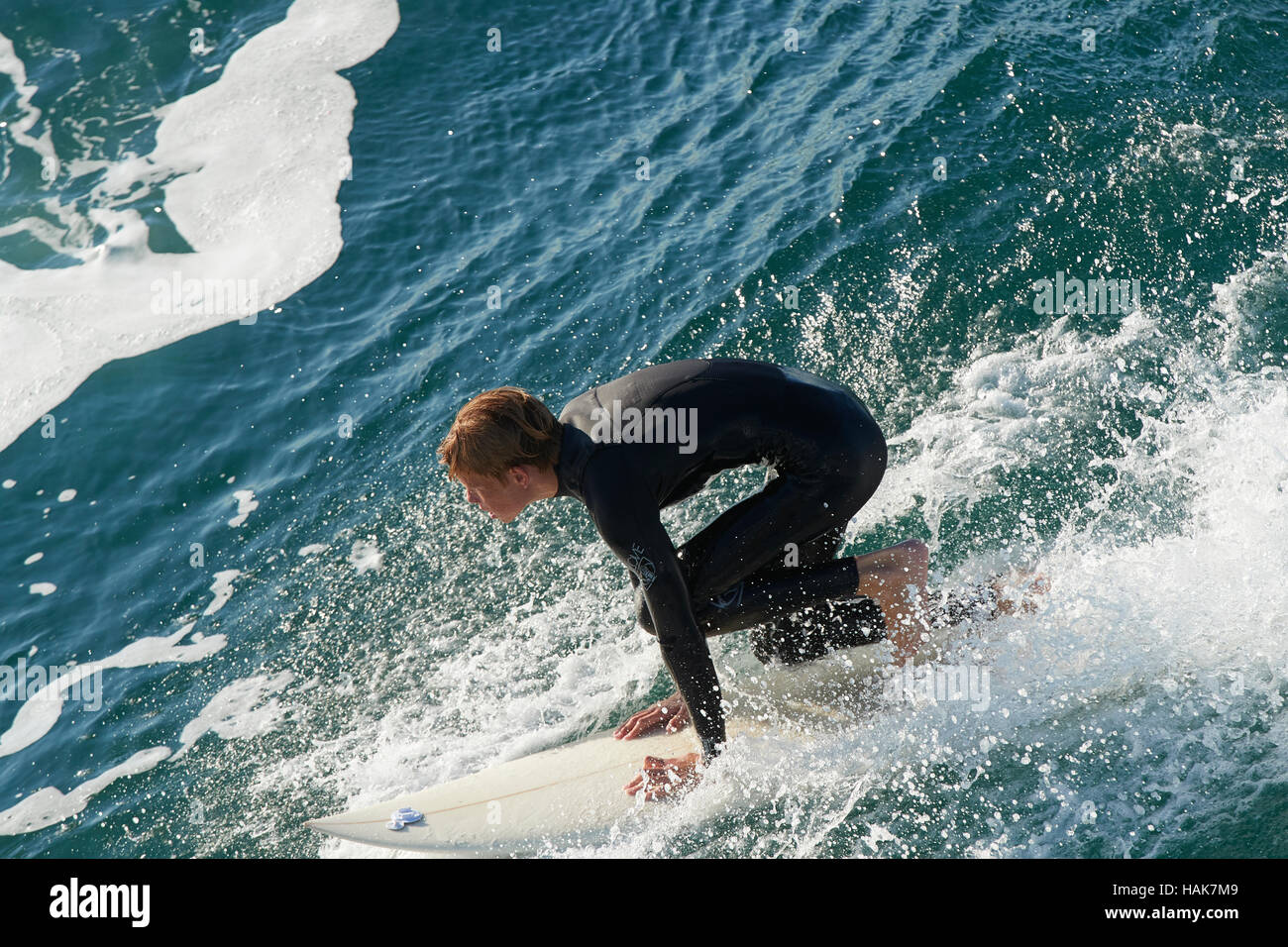 Young boy surfer in wetsuit hires stock photography and images Alamy