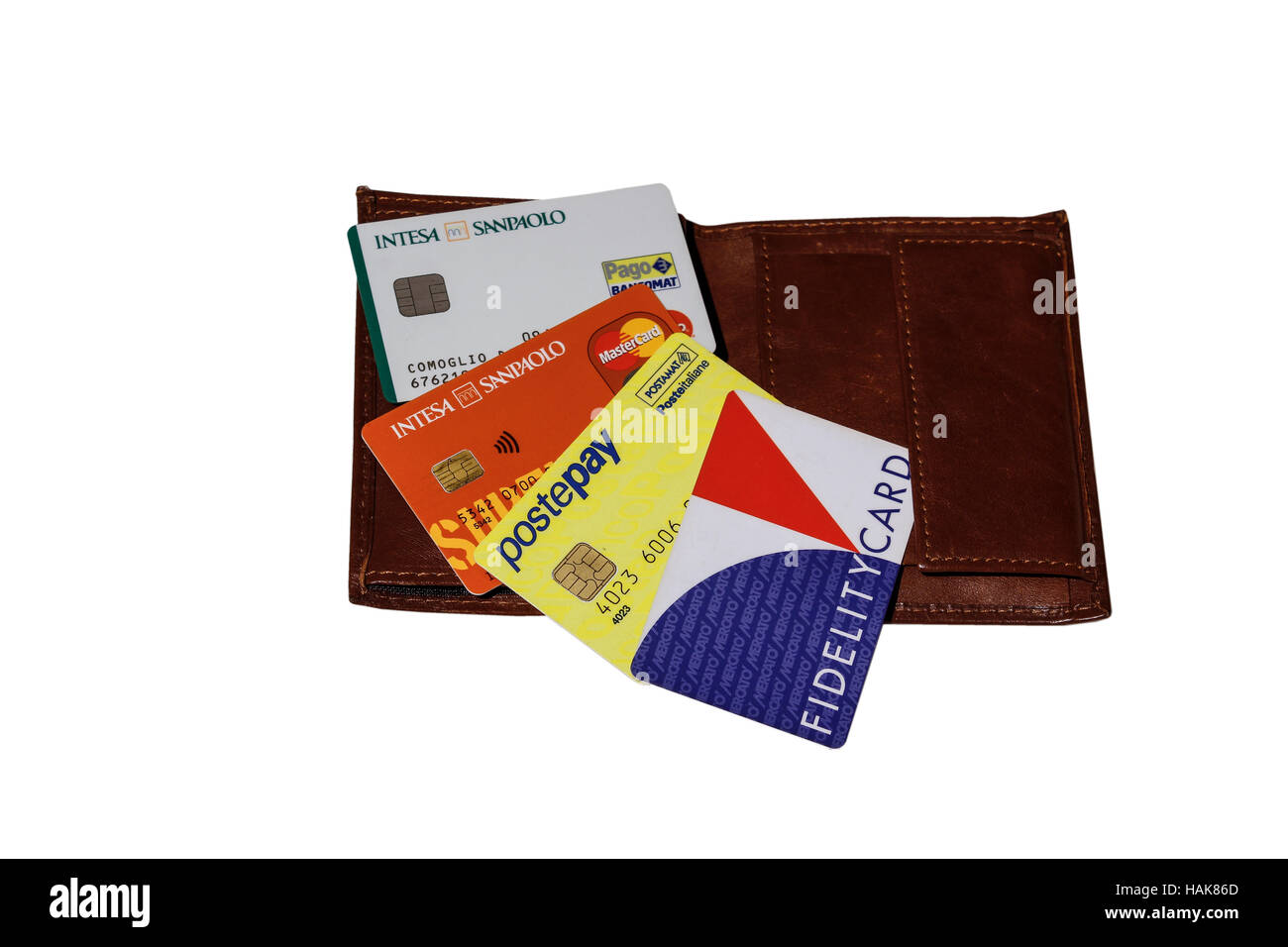 Credit cards and supermarket fidelity cards in front of a wallet Stock Photo