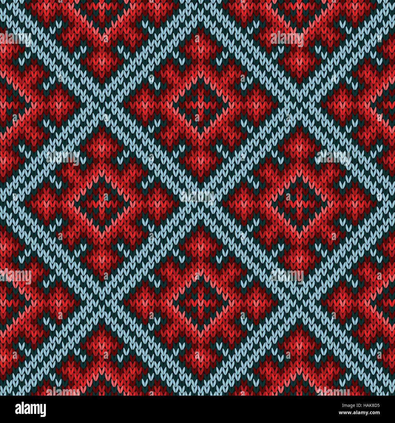 Knitted geometric motley background mainly in red and blue hues ...