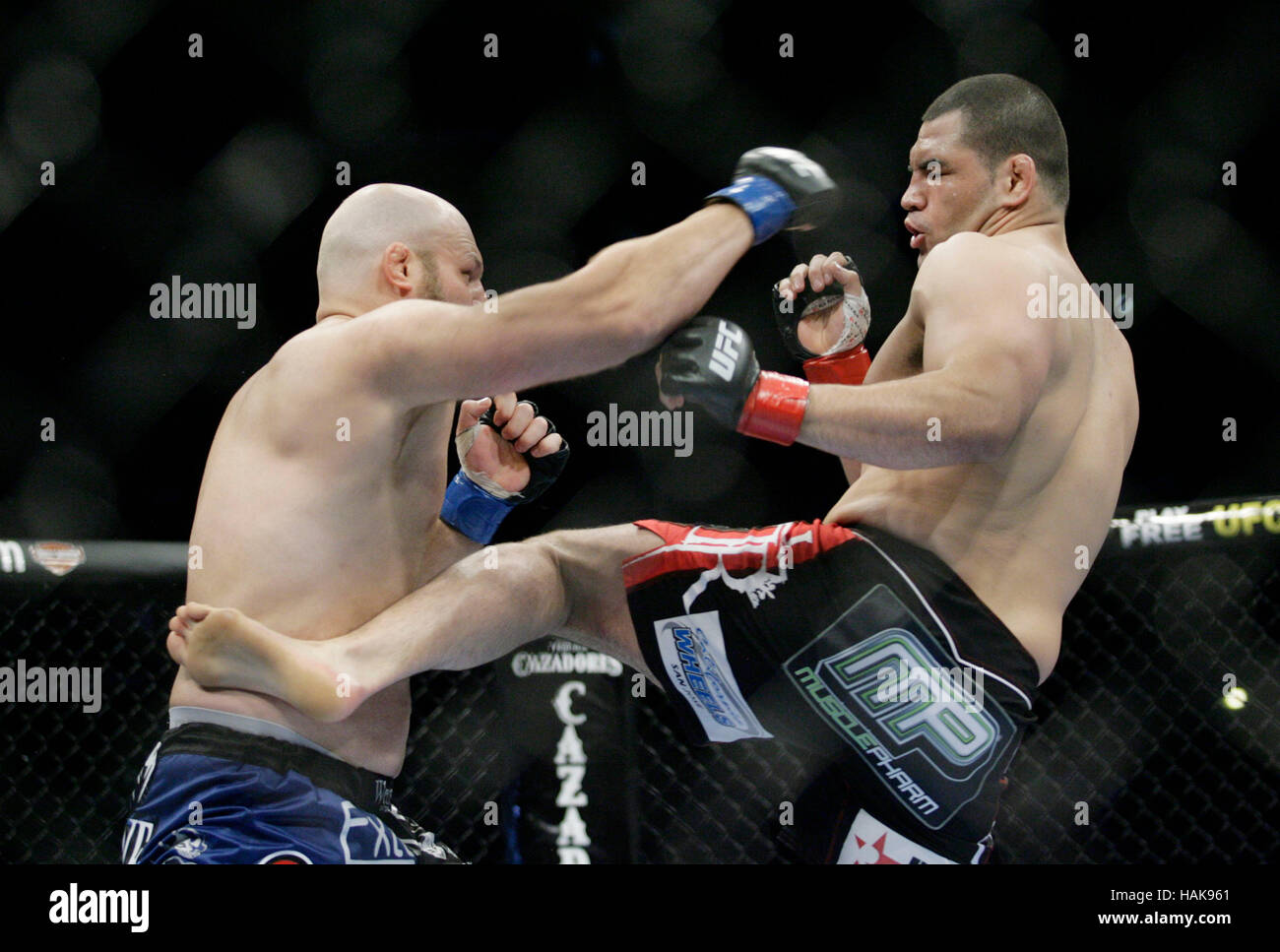 Cain Velasquez, right, fights Ben Rothwell at UFC 104 at the Staples Center in Los Angeles, California, on October 24, 2009. Francis Specker Stock Photo