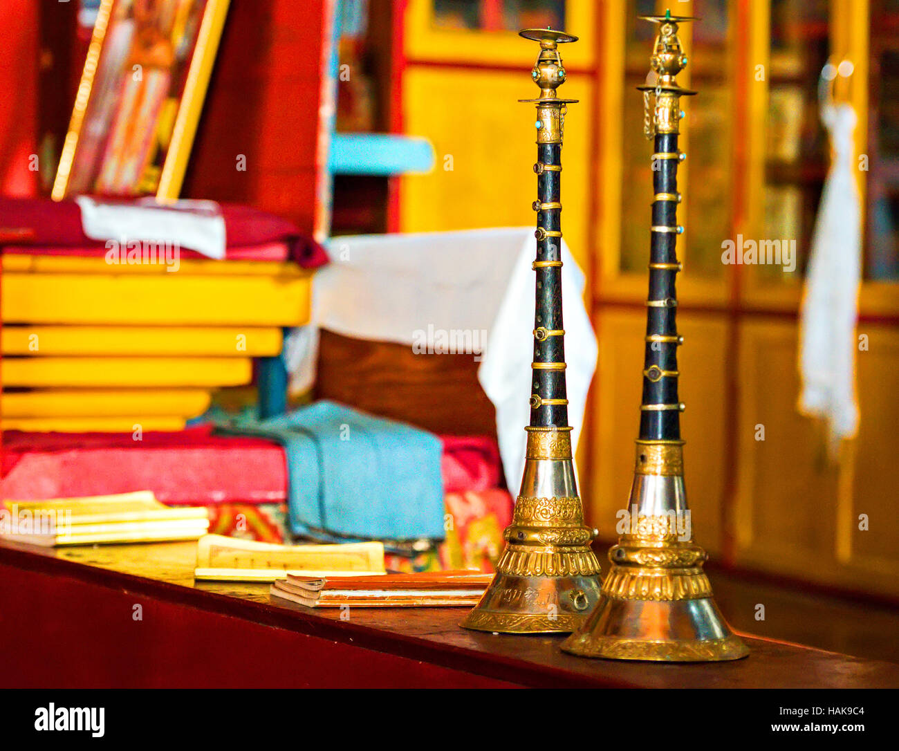 Buddhist prayer horns inside a monastery Stock Photo