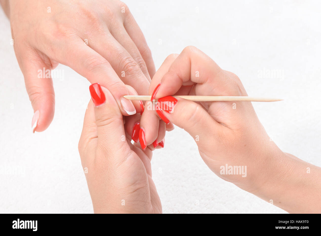 Cuticles care with cuticle pusher Stock Photo Alamy