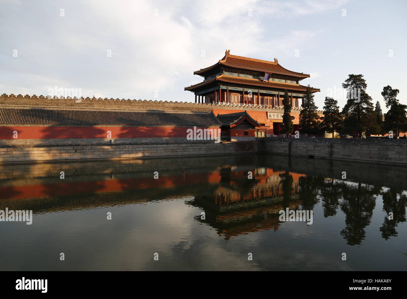 The Gate of Divine Prowess reflected in the Palace Moat (Tongzi He) that surrounds the Forbidden City in Beijing Stock Photo
