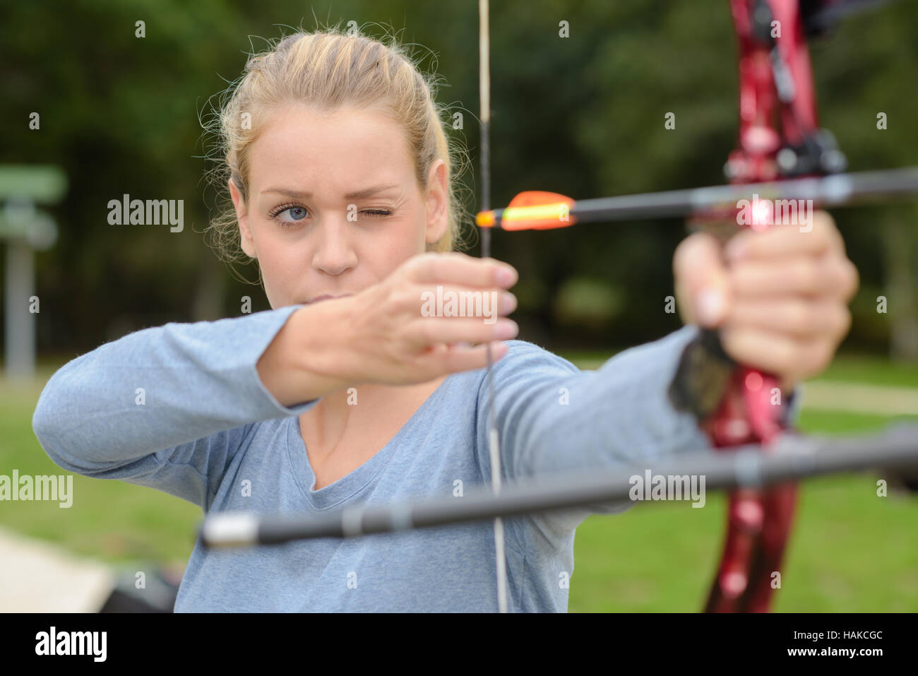 girl doing archery Stock Photo Alamy