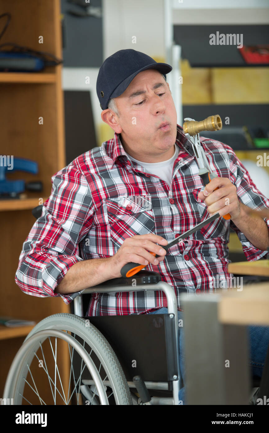 Handicap worker hi-res stock photography and images - Alamy