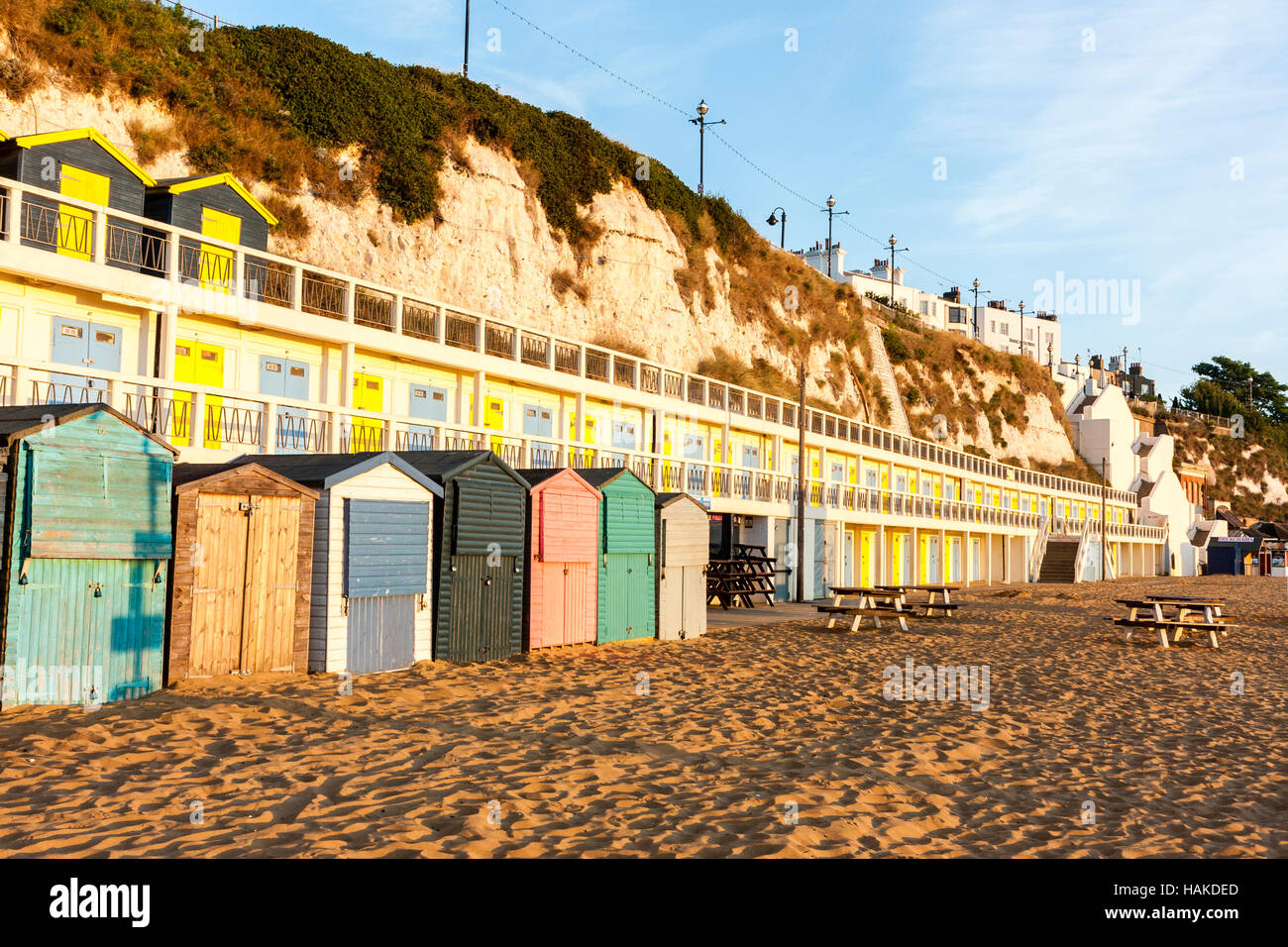 England, Broadstairs. Dawn. View along Beach huts with terrace of same