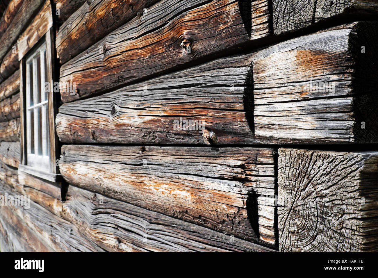 Close-up of weathered logs on traditional wooden building at Barkerville Historic Town in British Columbia, Canada Stock Photo