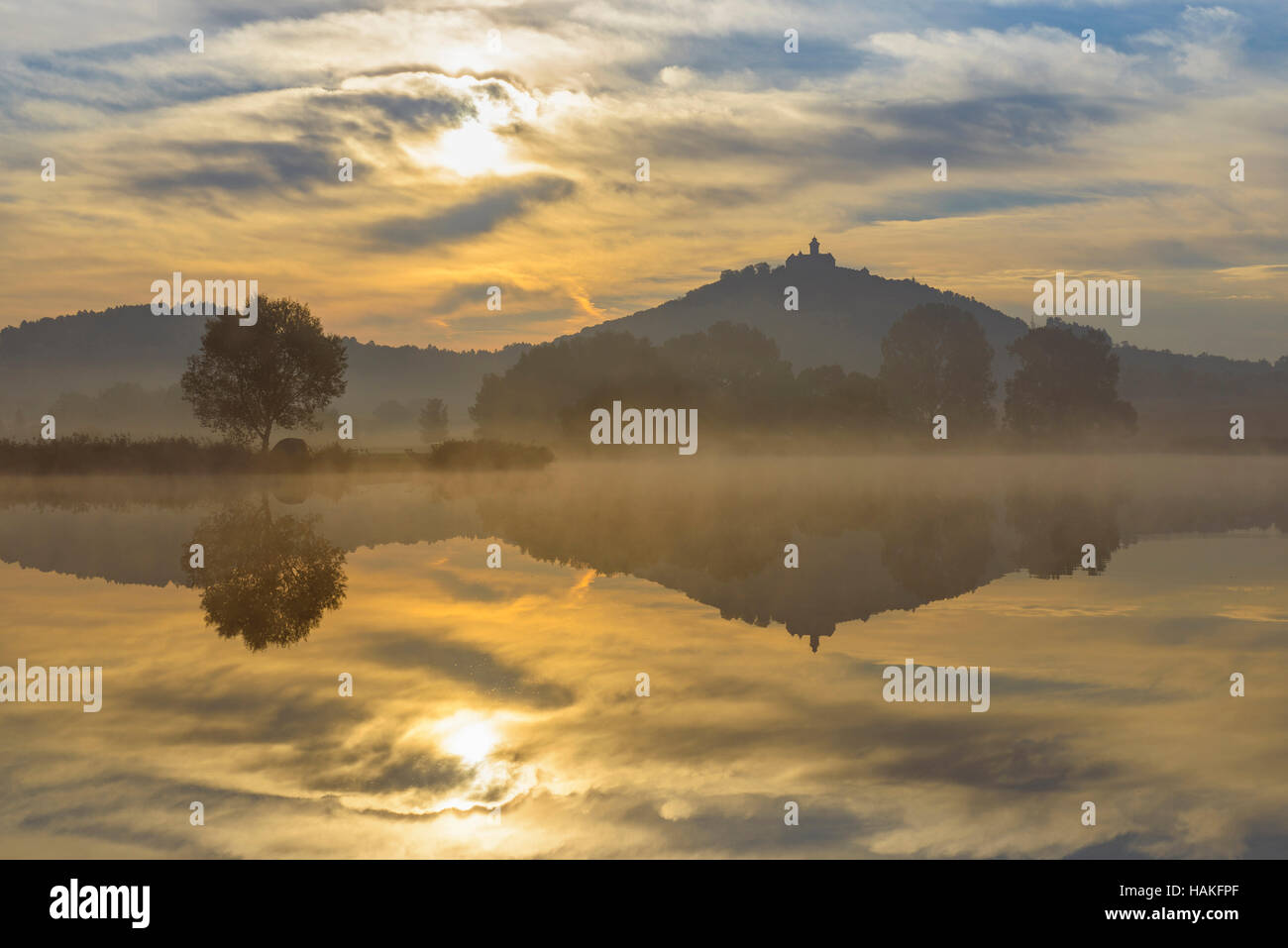 Wachsenburg Castle at Sunrise Reflecting in Lake, Drei Gleichen, Ilm District, Thuringia, Germany Stock Photo