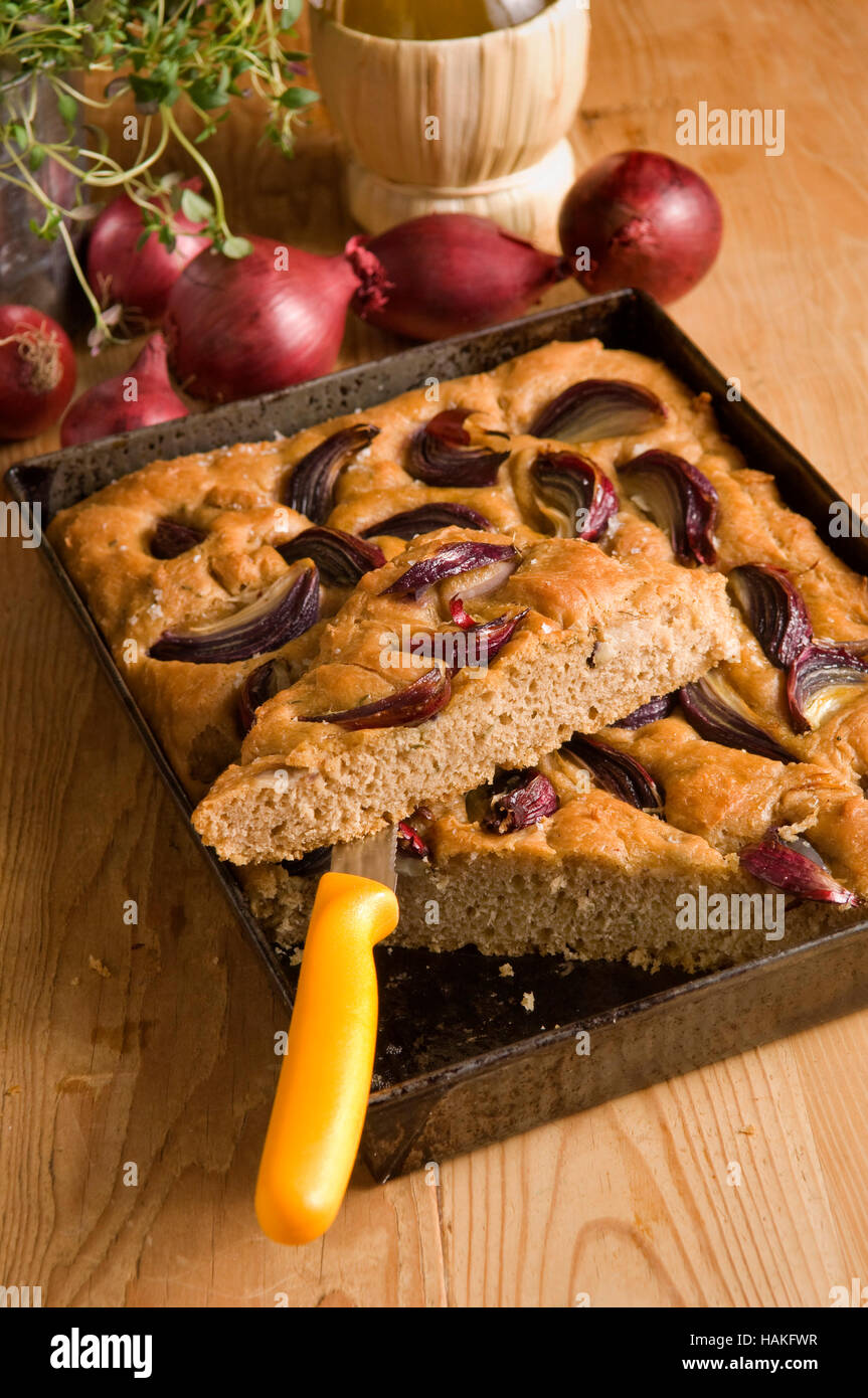 Focaccia bread with olive oil and red onions. a UK Italian bread bake
