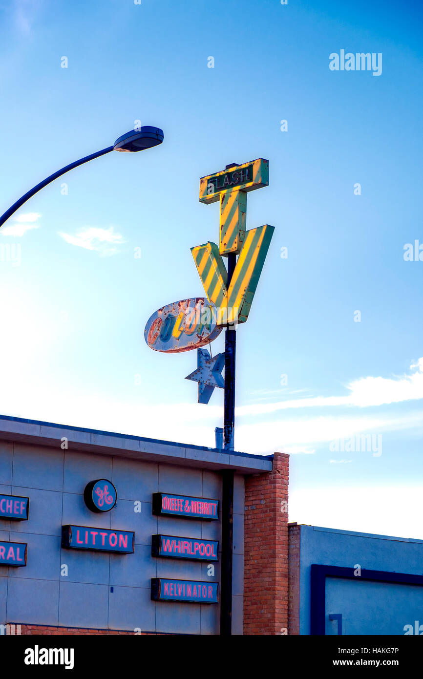 An old neon TV sign is still in use in Tucson, Arizona. Stock Photo