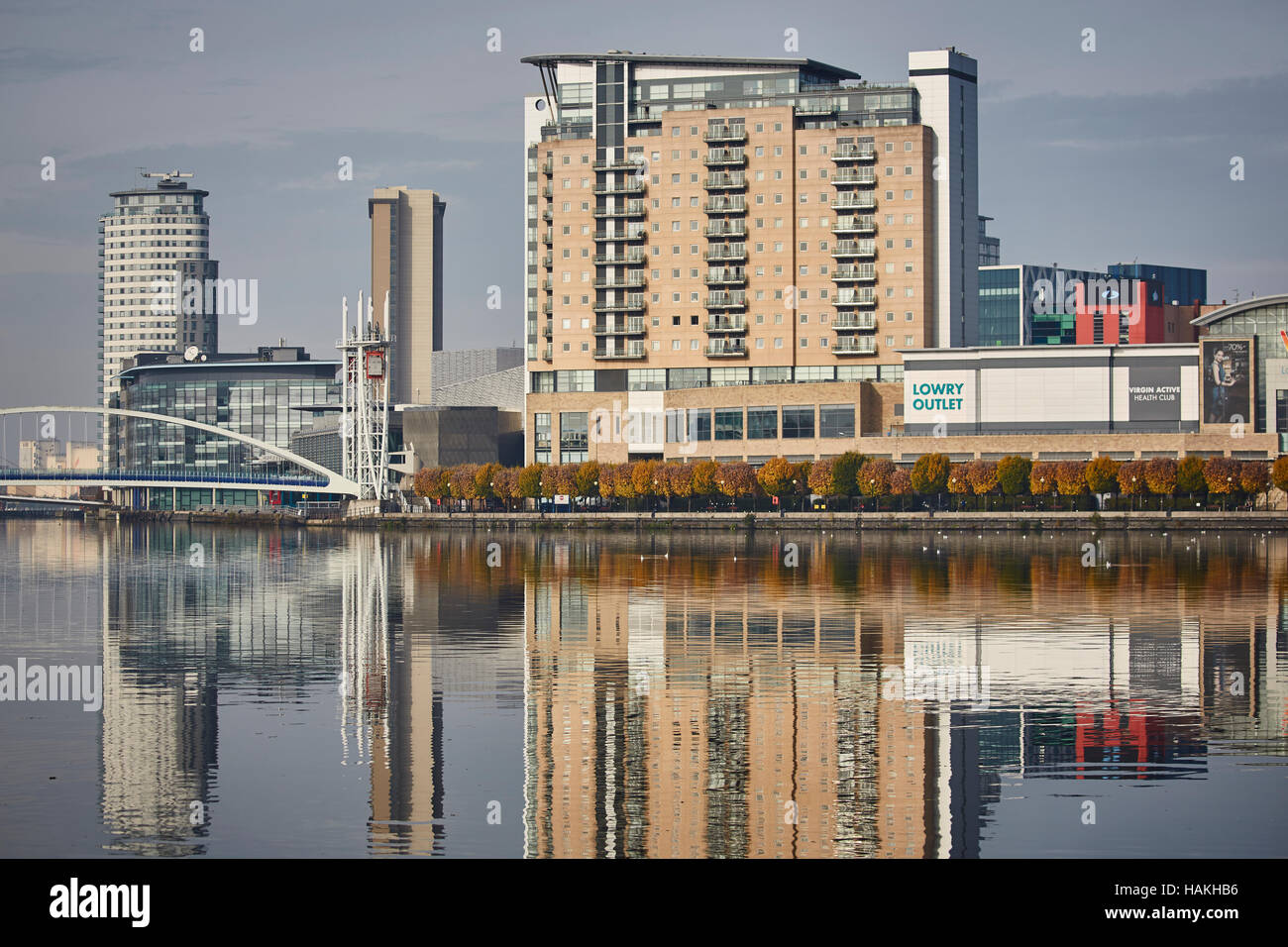Manchester Salford Quays landscape   Industrial revolution dock salford quays Ship Canal Lowry outlet Mediacity urban scape water front reflection reg Stock Photo