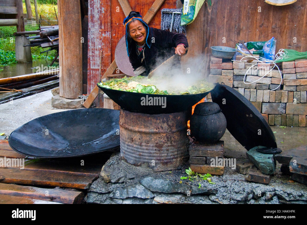 One of the ladies of the Kam Dong Village in Guizhou Province of China relaxes. Stock Photo