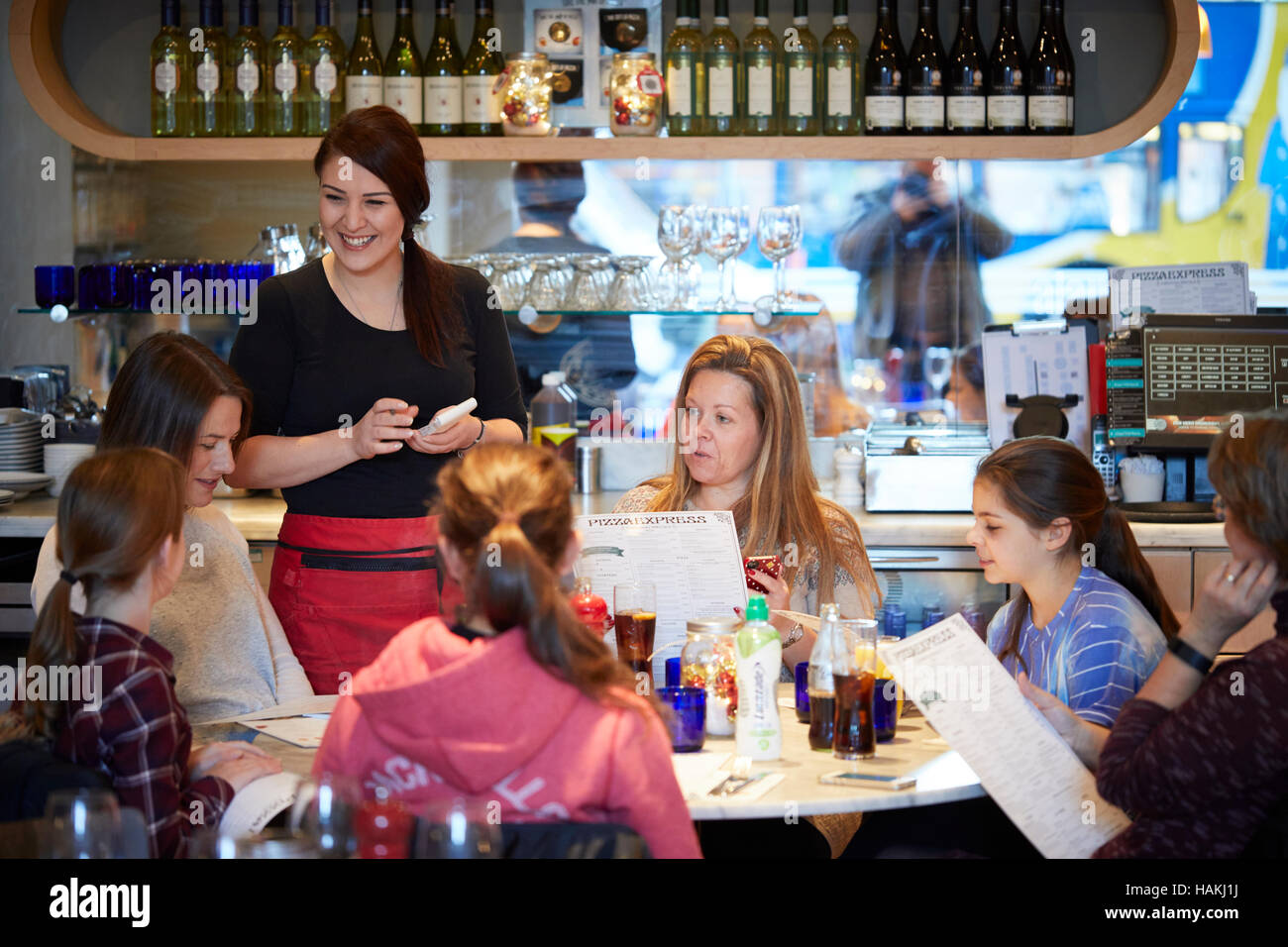 Pizza Express restaurant interior waitress Italian food waiter serving