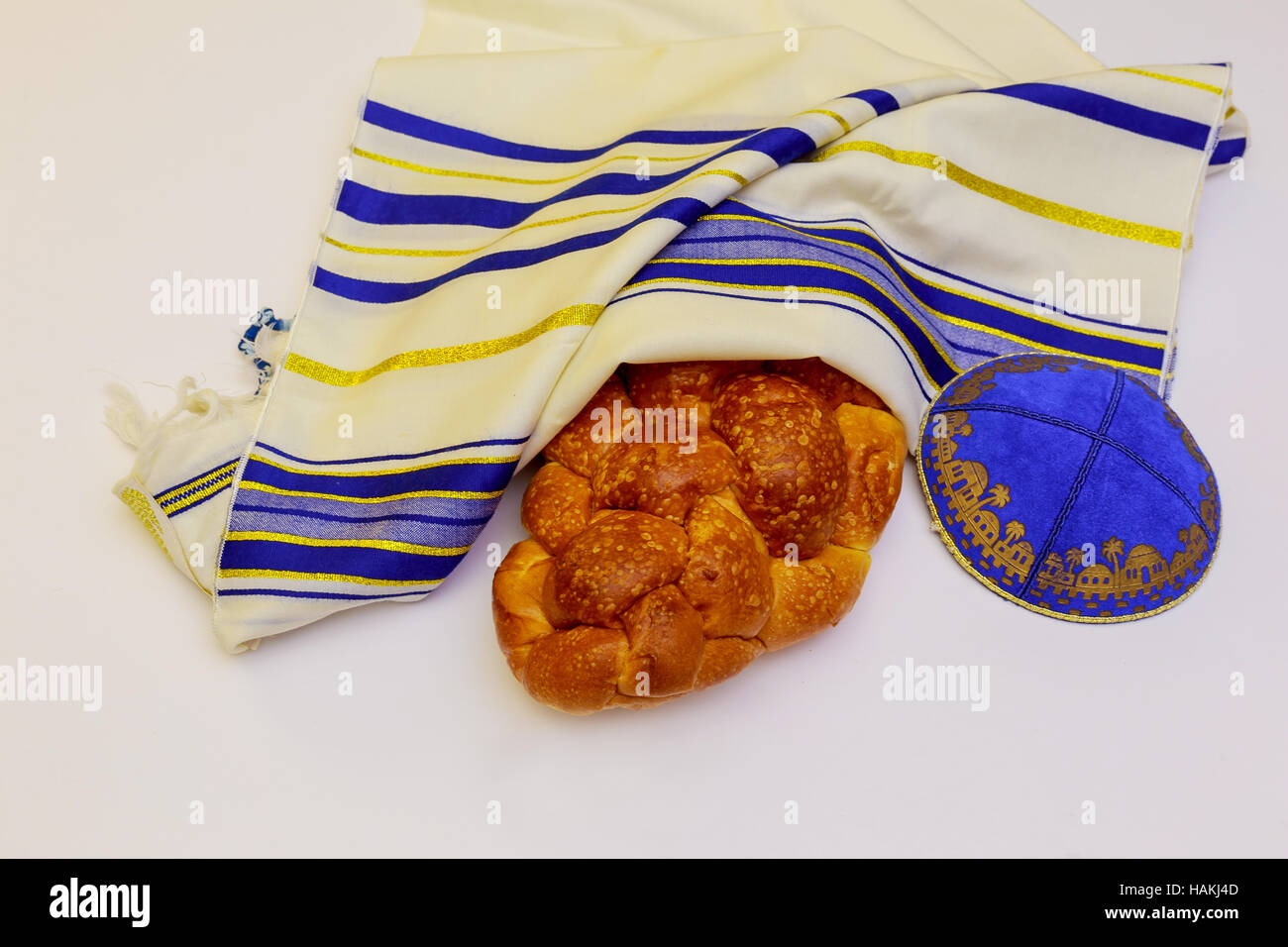 Shabbat candles in glass Jewish holiday Sabbath Prayer Shawl Tallit and