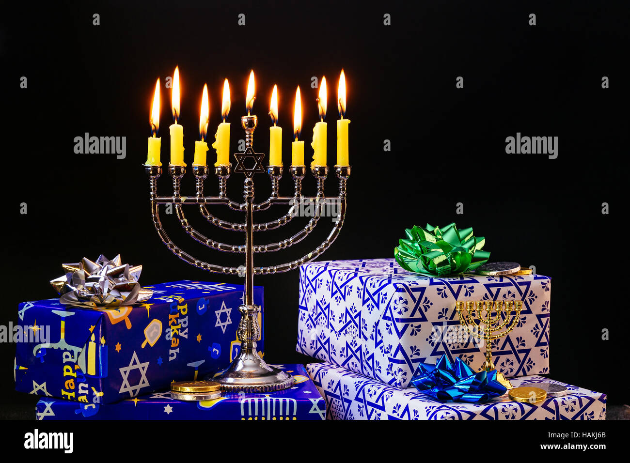 Jewish holiday hanukkah celebration with vintage menorah tallit Stock Photo