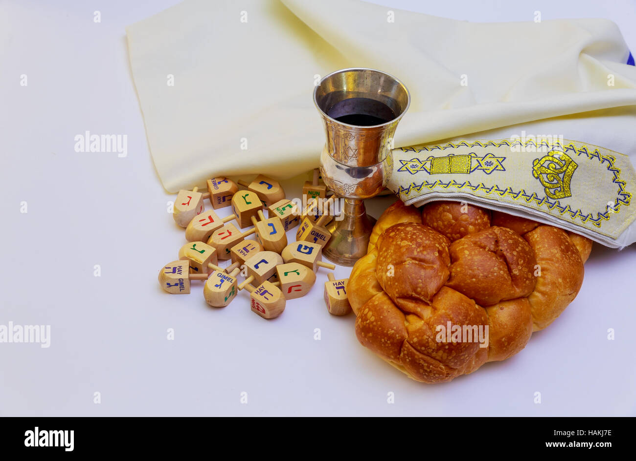 Shabbat candles in glass Jewish holiday Sabbath Prayer Shawl Tallit and