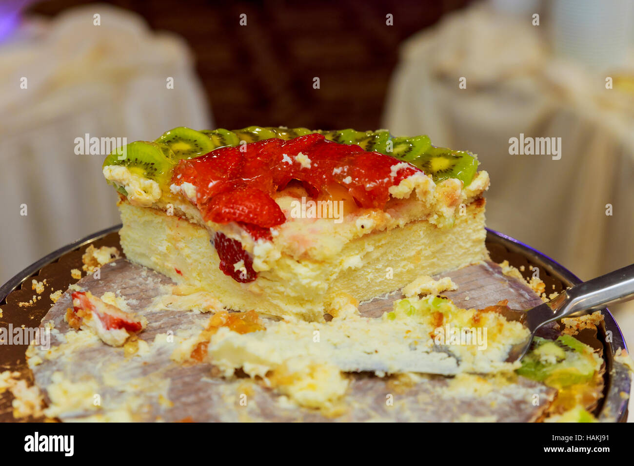 Wedding decoration with colorful eclairs, souffle, meringues, muffins