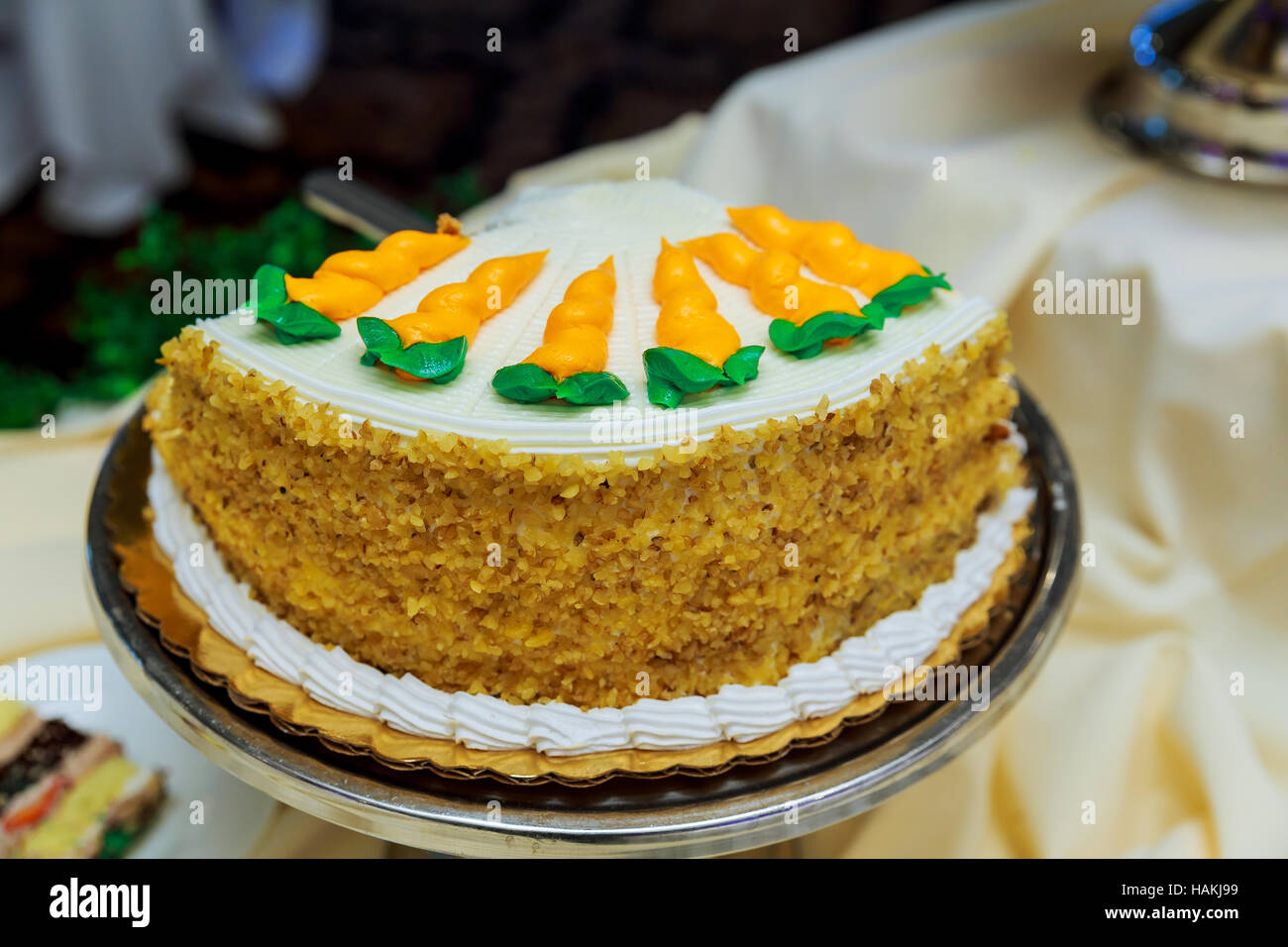 Wedding decoration with colorful eclairs, souffle, meringues, muffins