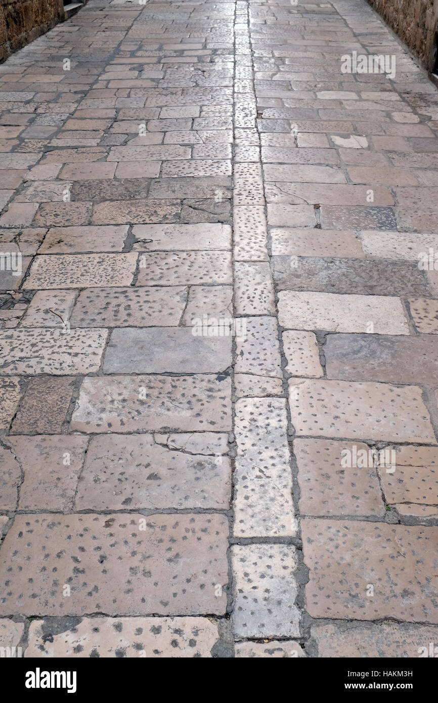 Stone blocks paved road in Dubrovnik, Croatia on December 01, 2015. Stock Photo