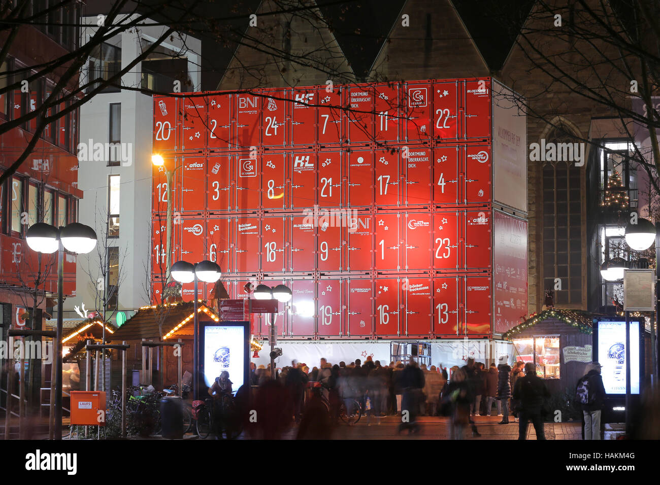 Dortmund/Germany, Dec.1th 2016. The first door has been  opened at the supposedly largest Advent calendar of the world. Made of 30 ship containers the Advent calendar is 15 x 13 meters in size and has a total weight of 64 tonnes. Behind the first door was a voucher for the furnishing of a children's home in Dortmund. From December 1th onwards, a Christmas child will open a door every day at 18:00 from above a lifter. Stock Photo