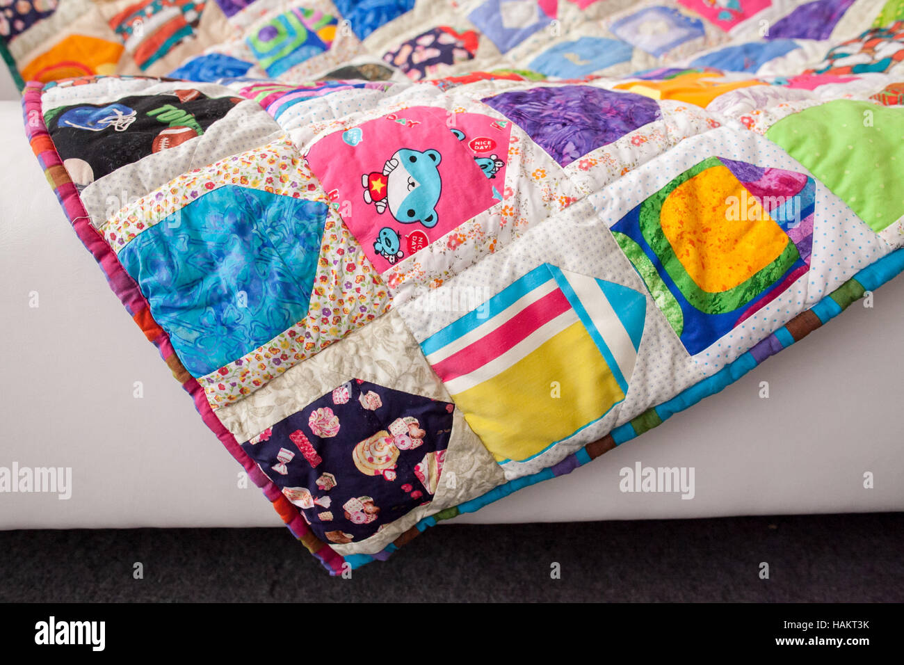 Patchwork quilt. Part of patchwork quilt as background. Handmade ...