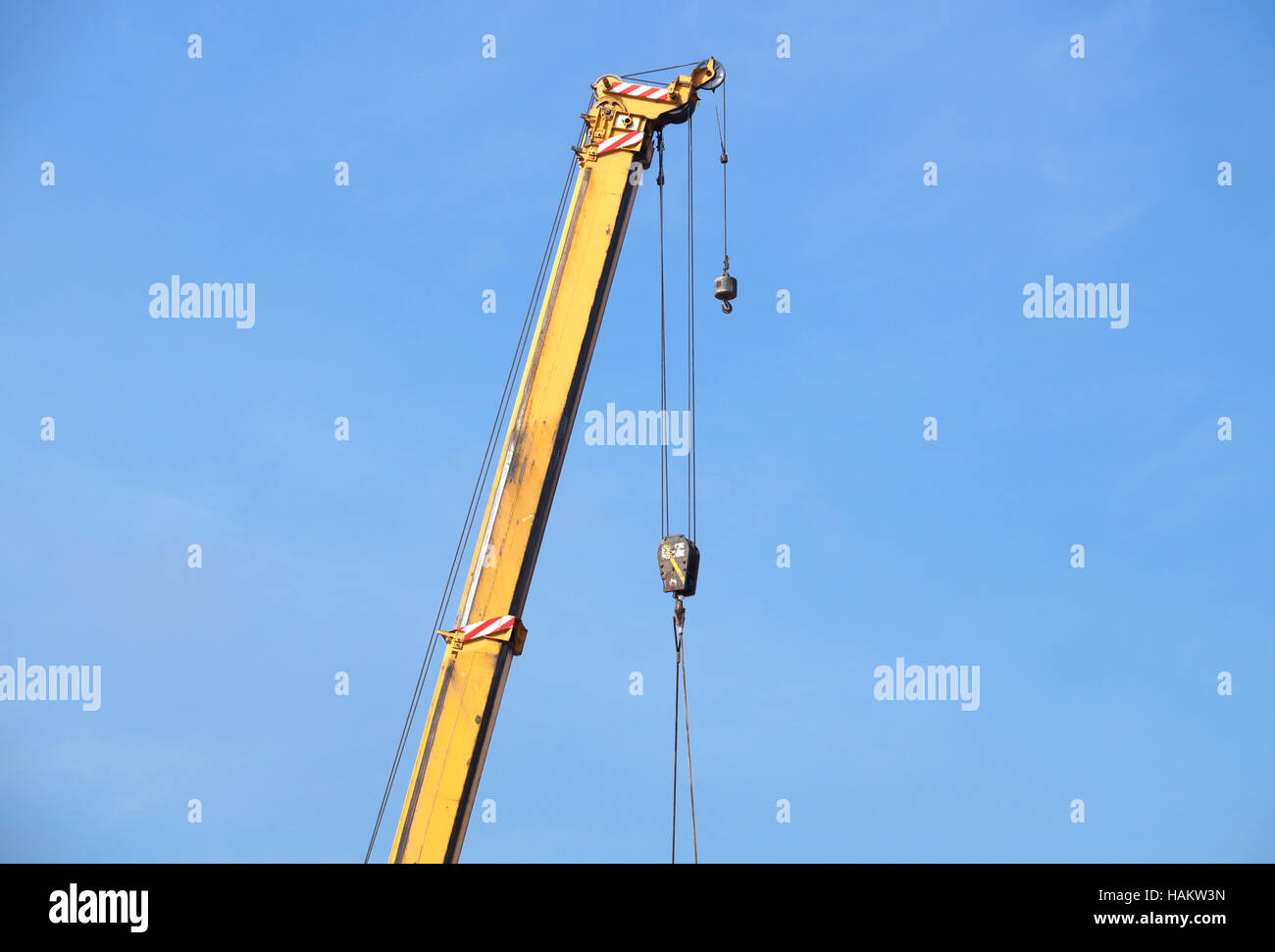 Boom of mobile crane with blue sky background Stock Photo Alamy