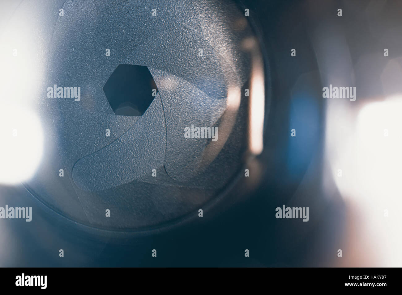 Lens front side exposed aperture blades. Aperture blade of camera lens