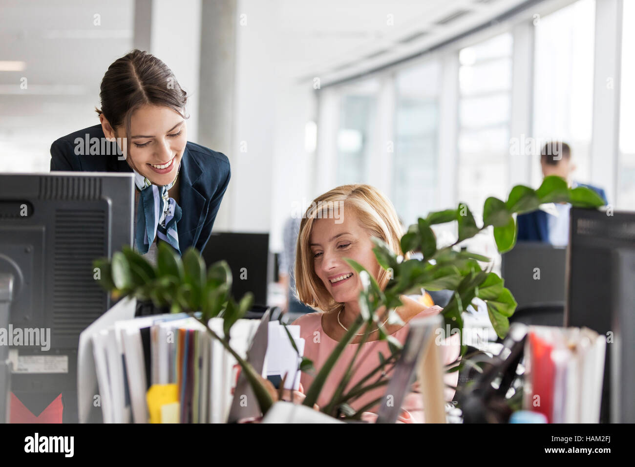 Businesswomen working at computer in office Stock Photo - Alamy