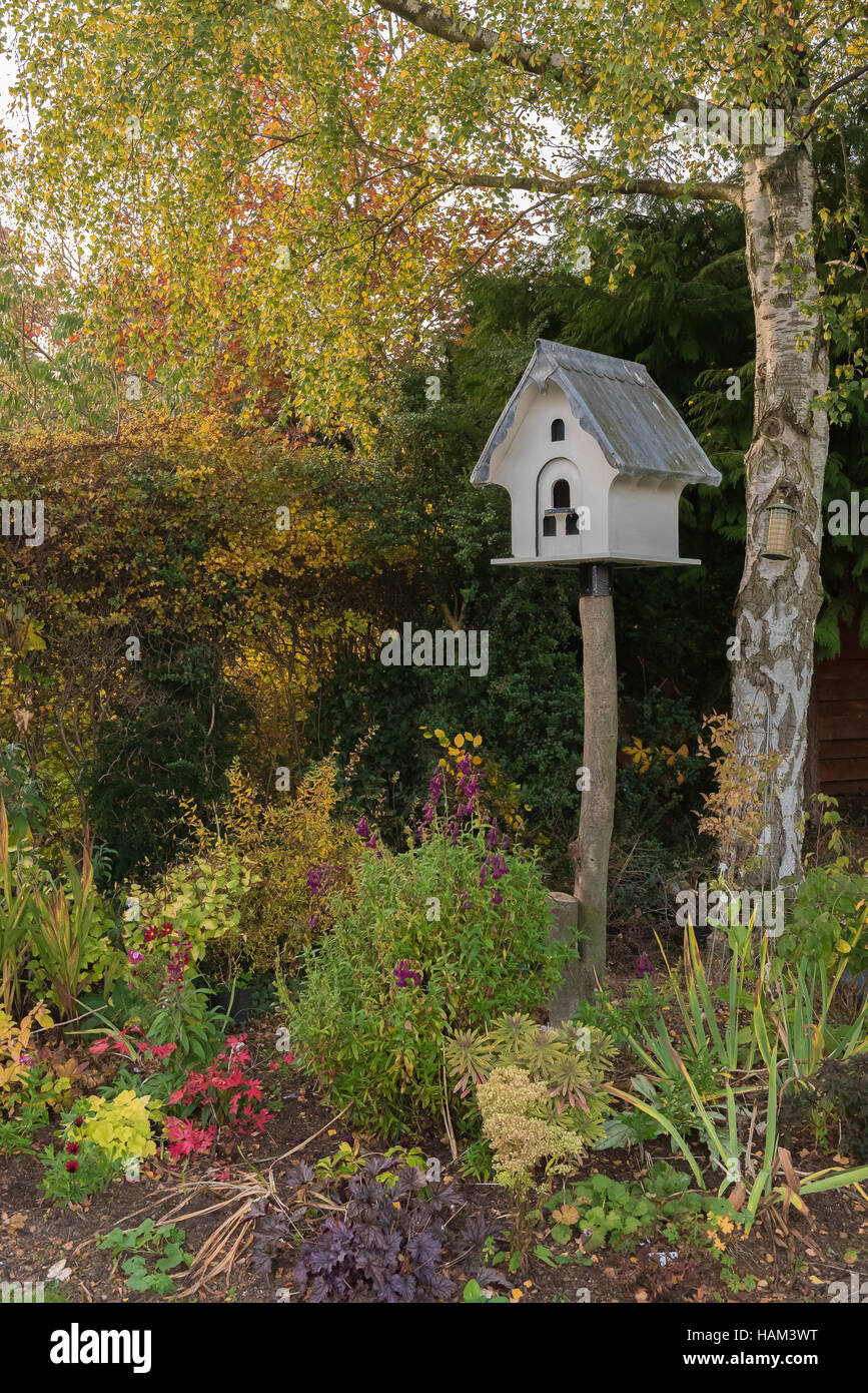 Birdhouse in an English Garden Stock Photo Alamy