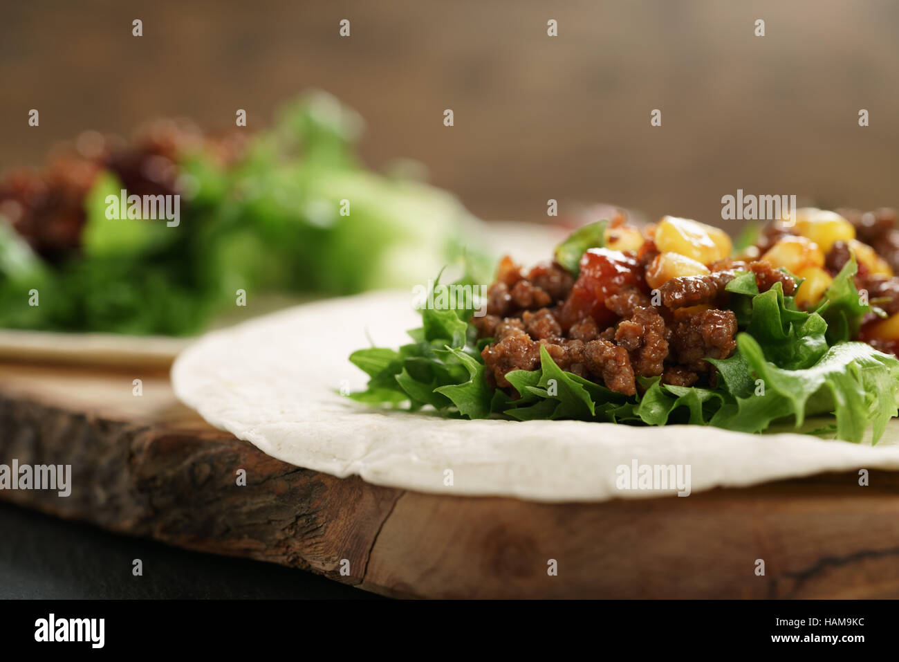 open tortilla with beef, frillice and corn Stock Photo