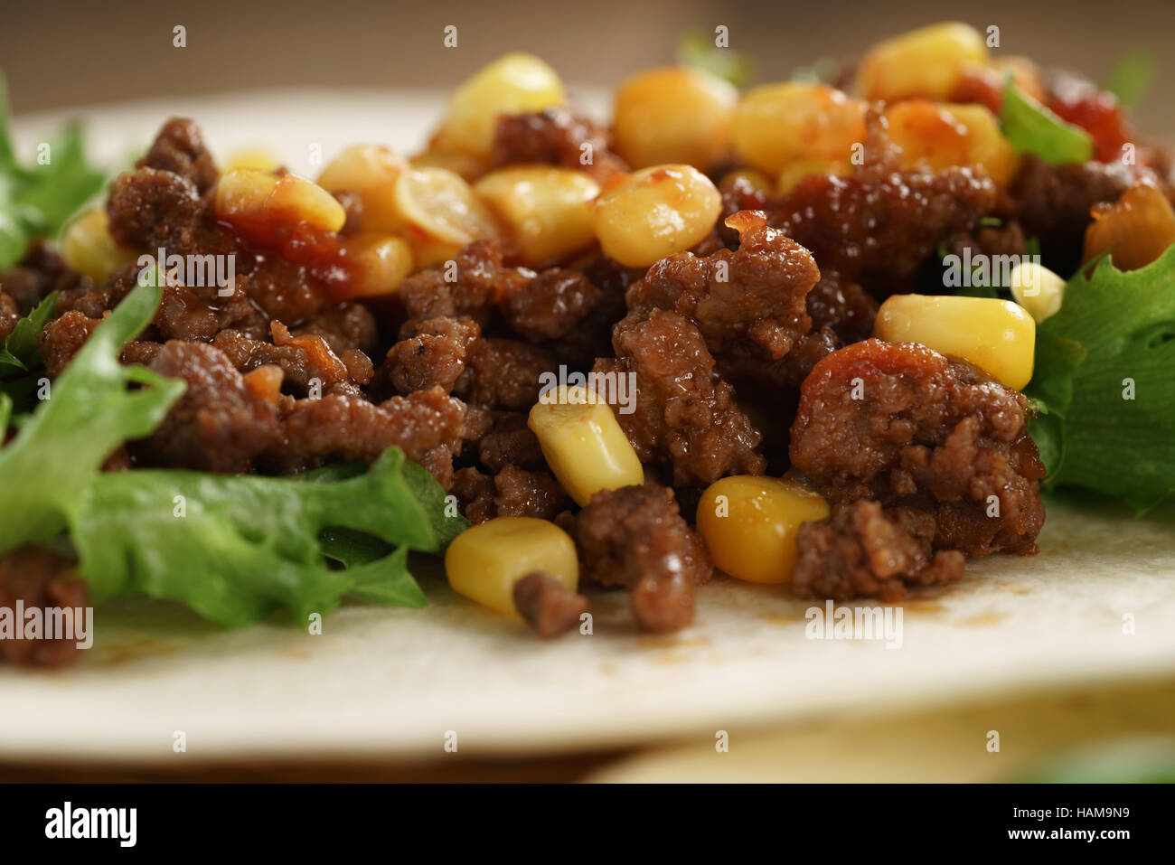 open tortilla with beef, frillice and corn Stock Photo