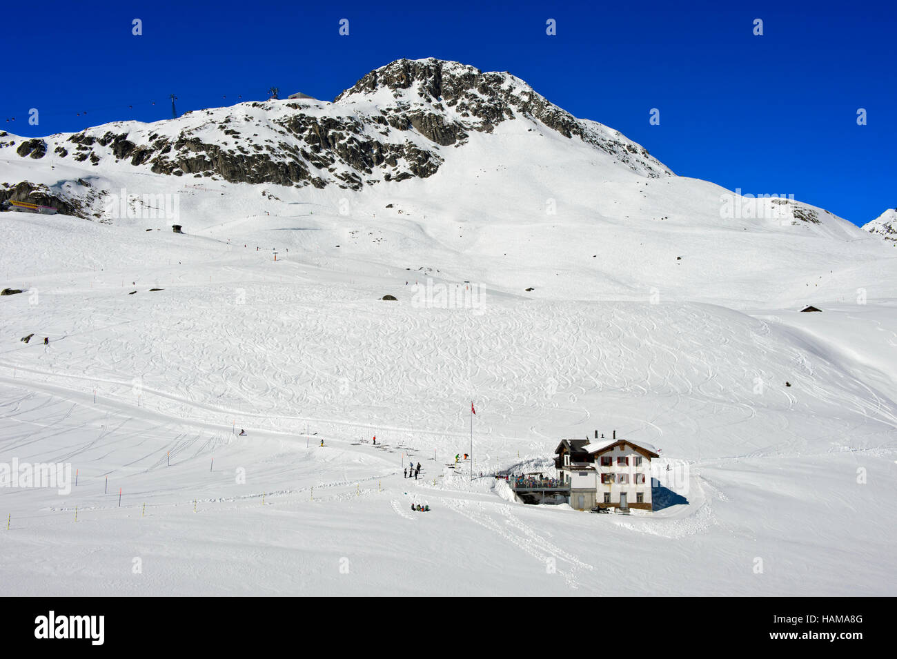 Bättmer-Hittaunter mountain cottage in front of Bettmerhorn Aletsch Arena, Bettmeralp, Valais, Switzerland Stock Photo