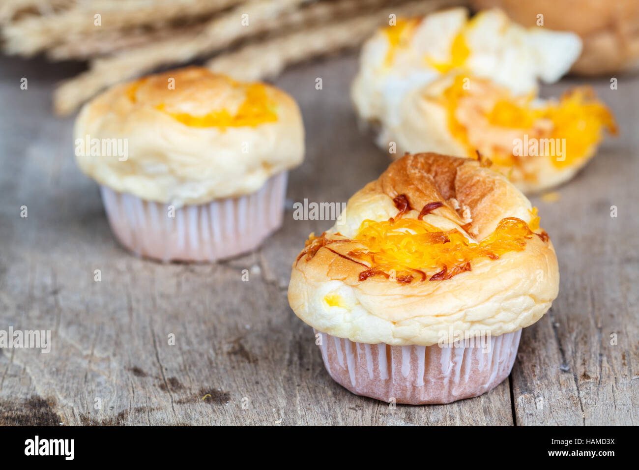 Muffin golden threads on wood table. Thai dessert call Foi Thong. Stock Photo