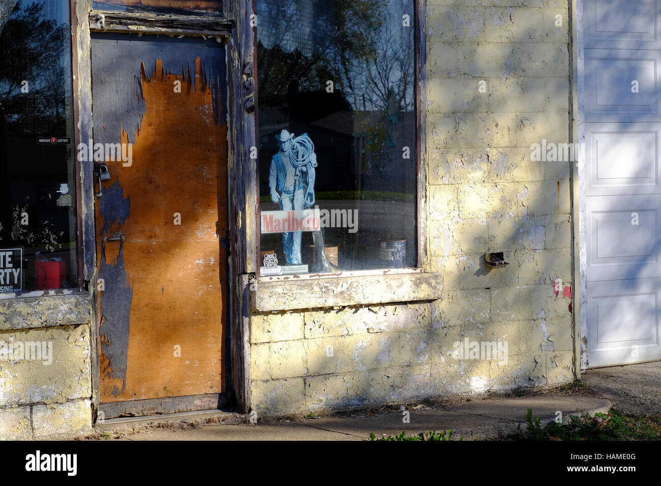 The Marlboro Man is fading but still around in this abandoned gas station in Jefferson, Indiana Stock Photo
