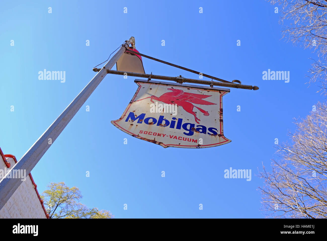 An old Mobilgas sign still stands in front of a historic gas station in Indiana Stock Photo