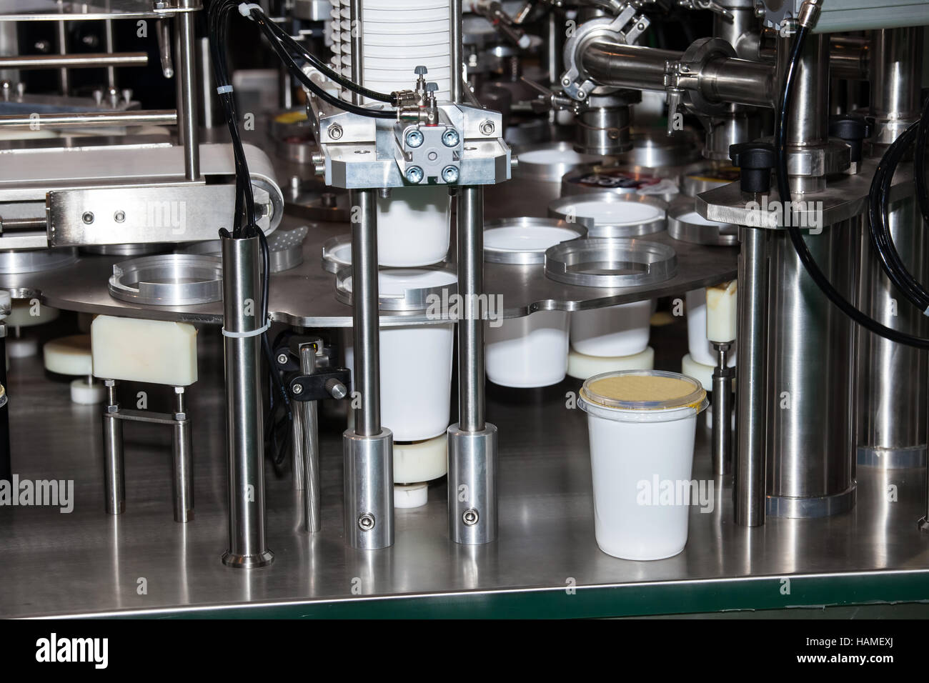 Filling and sealing machine Stock Photo