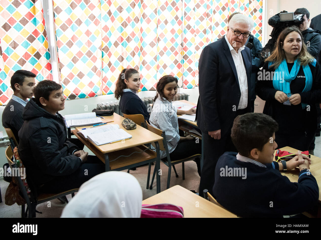 German Minister of Foreign Affairs Frank-Walter Steinmeier (SPD) talks to students at the 'Houch rl-Omara' school in Zahlé, Lebanon, 2 December 2016. The German Foreign Minister learned about the situation of refugees from the neighbouring Syria during his one-day visit. Photo: Bernd von Jutrczenka/dpa Stock Photo
