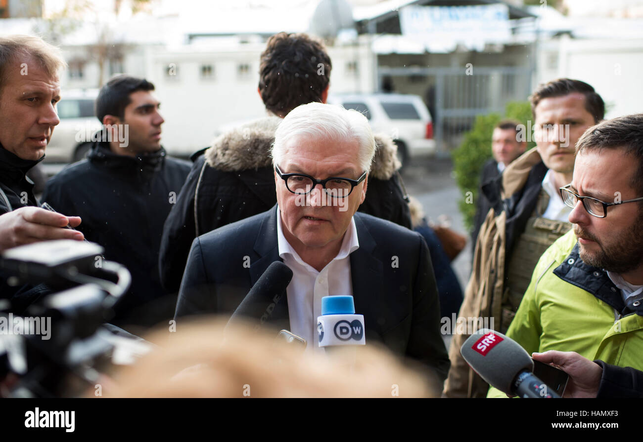 German Minister of Foreign Affairs Frank-Walter Steinmeier (c, SPD) gives a statement at the UNHCR offices in Zahlé, Lebanon, 2 December 2016. The German Foreign Minister learned about the situation of refugees from the neighbouring Syria during his one-day visit. Photo: Bernd von Jutrczenka/dpa Stock Photo