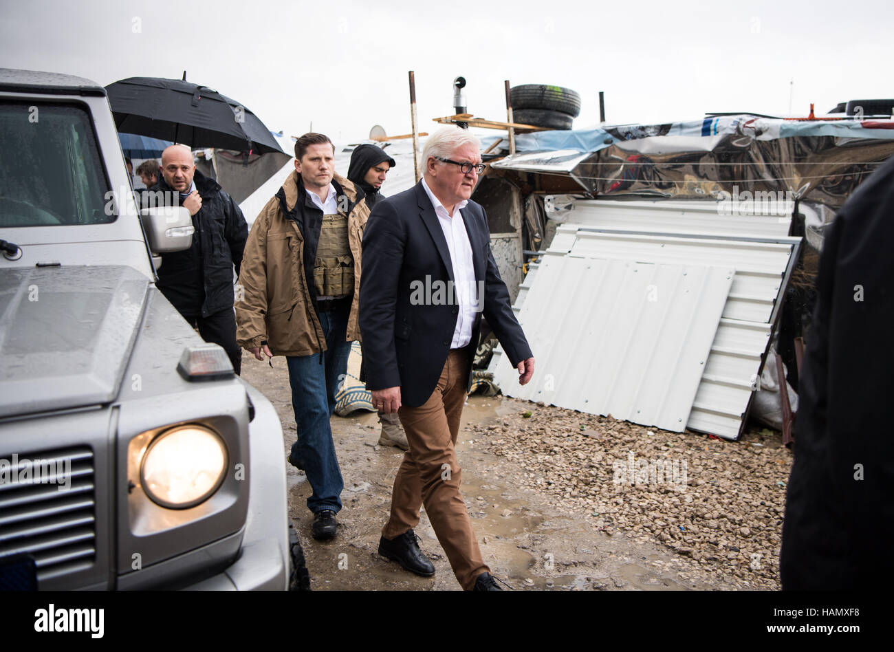 German Minister of Foreign Affairs Frank-Walter Steinmeier (SPD) visits the refugee camp 'Saadnayel 019' for Syrian refugees near Zahlé, Lebanon, 2 December 2016. The German Foreign Minister learned about the situation of refugees from the neighbouring Syria during his one-day visit. Photo: Bernd von Jutrczenka/dpa Stock Photo
